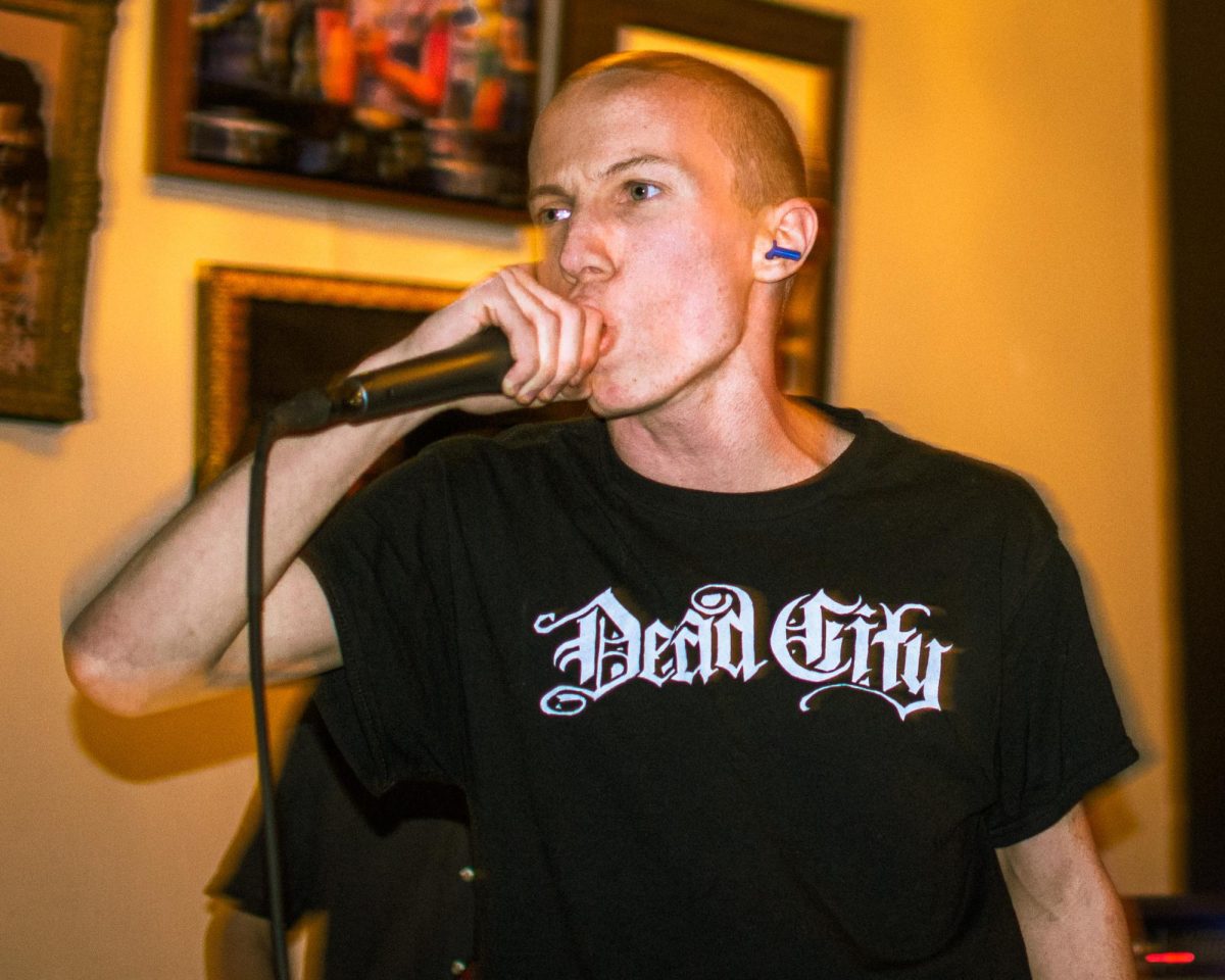 Drew Cramer-Hicks (10) belts punk hymns into the microphone.