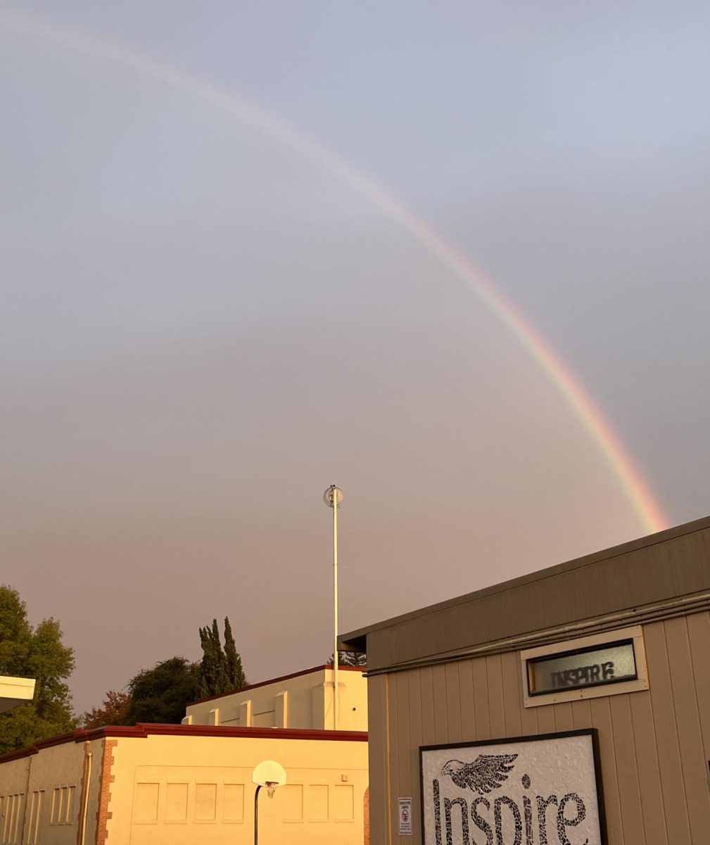 A rainbow shines over the Inspire campus.
