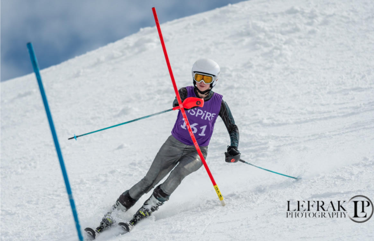 MK Kidd skis down a slope during the final race