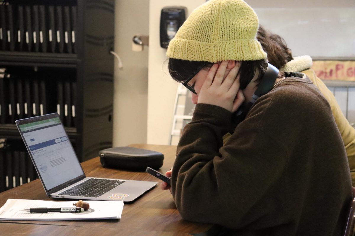 An Inspire student uses their phone during a study hall