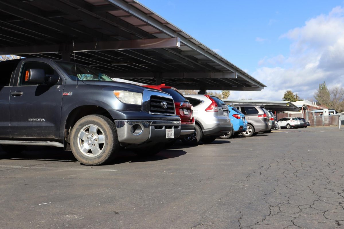 Cars in the shared Chico High-Inspire parking lot.