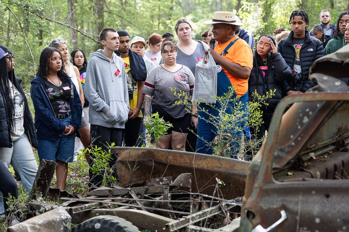 Dennis Dahmer tells Sojourn students about an abandoned car destroyed by the Ku Klux Klan.