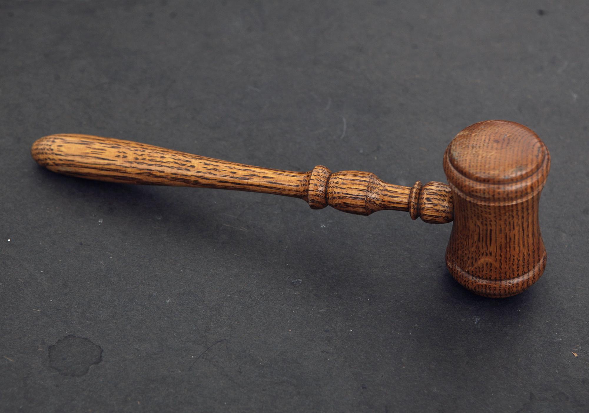 The judge's gavel is seen in court room 422 of the New York Supreme Court at 60 Centre Street February 3, 2012.  Picture taken February 3, 2012.  REUTERS/Chip East (UNITED STATES - Tags: CRIME LAW)